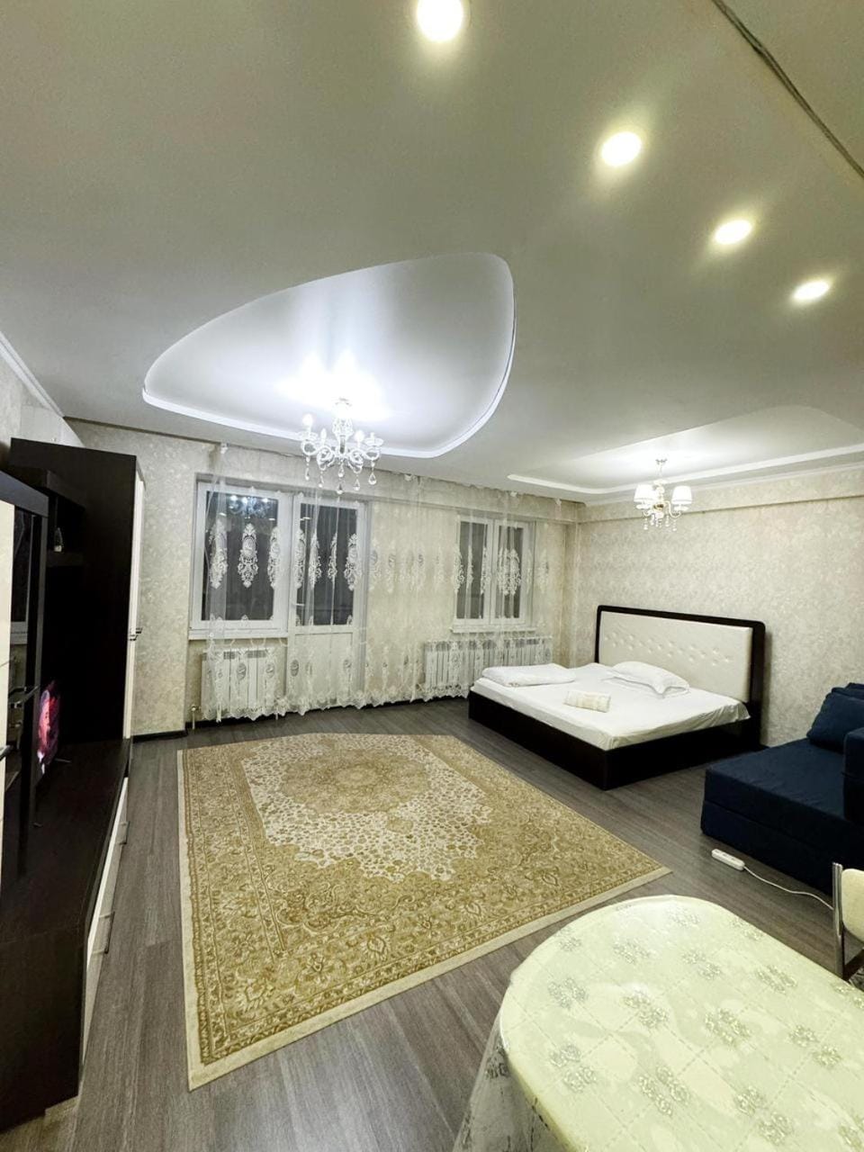 Bed, TV and multimedia, Living room, Photo of the whole room, Seating area, Bedroom