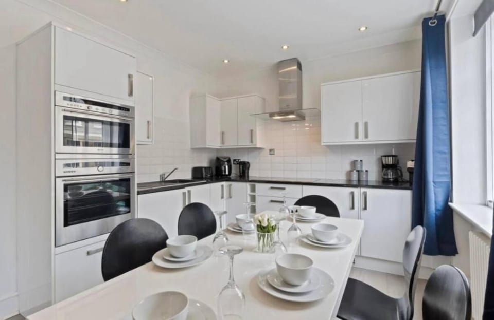 Kitchen or kitchenette, Dining area, dishwasher, stove, toaster