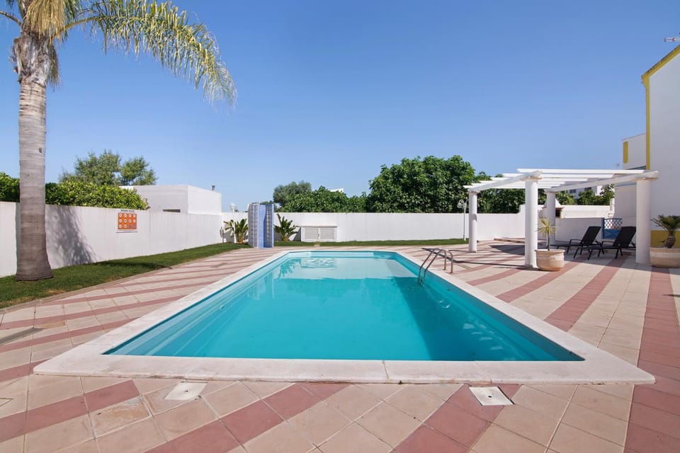 Property building, Living room, Swimming pool