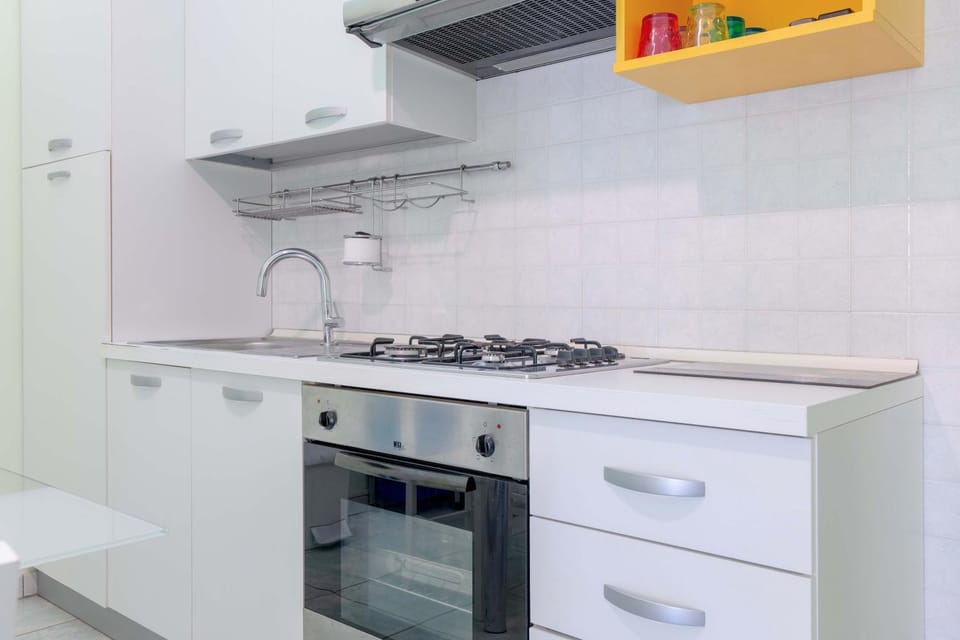 Kitchen or kitchenette, stove