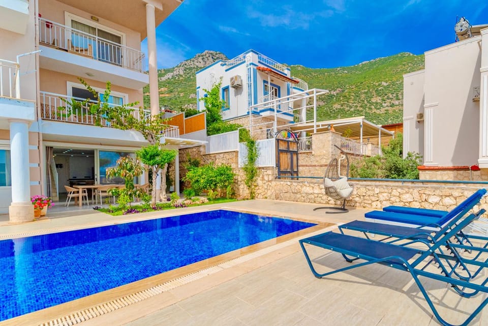 Property building, Patio, Spring, Day, Natural landscape, Mountain view, Pool view, Swimming pool, sunbed