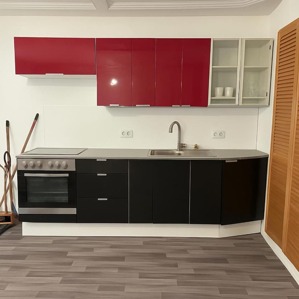 Kitchen or kitchenette, stove