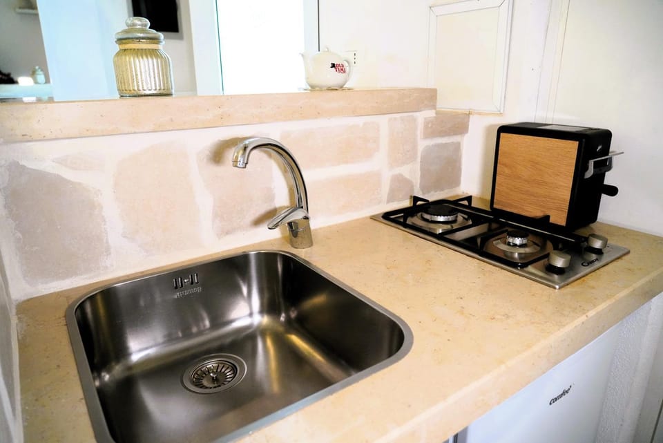 Kitchen or kitchenette, stove
