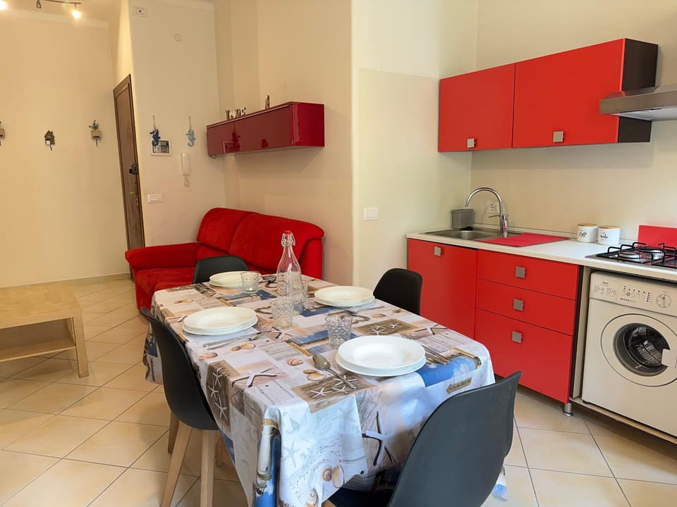 Kitchen or kitchenette, Living room, Photo of the whole room, Seating area, Dining area, stove, washing machine