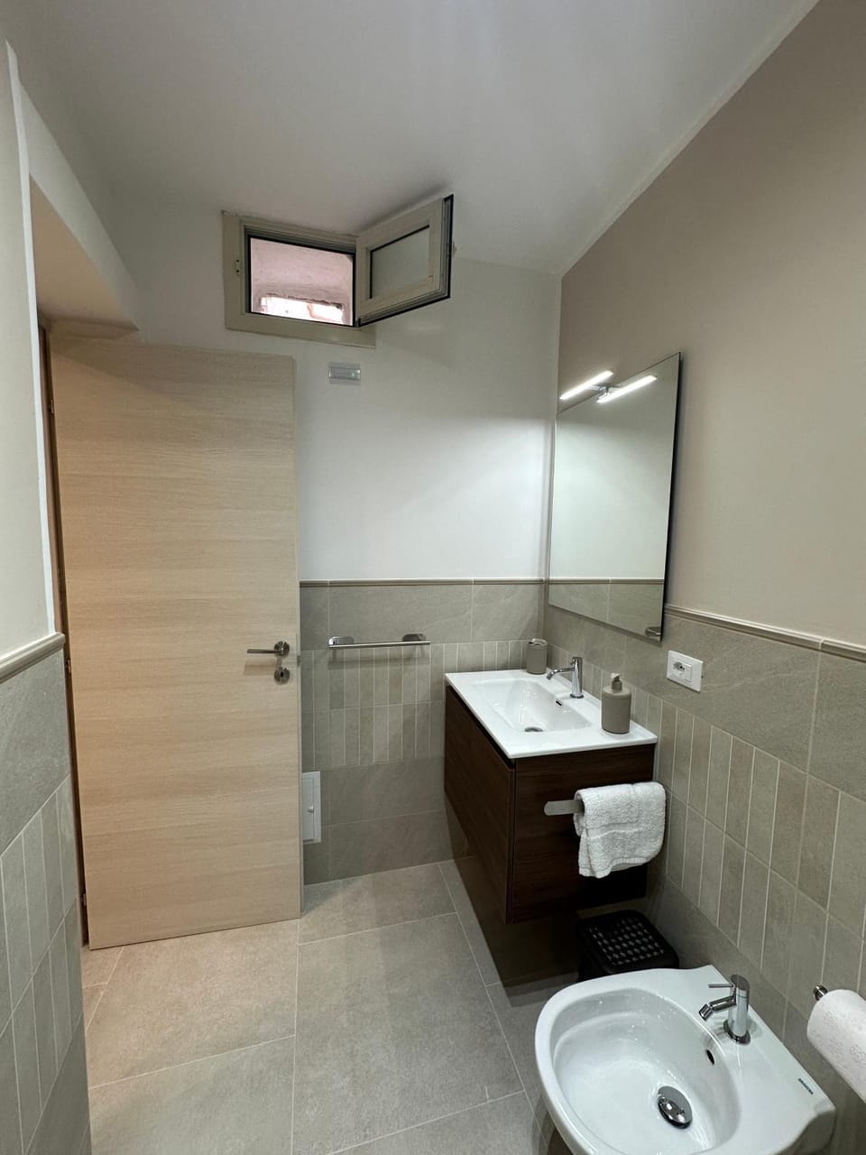Bathroom, bidet, towels