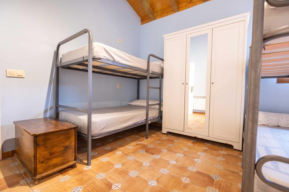 Bed, Photo of the whole room, Bedroom, bunk bed, towels, wardrobe