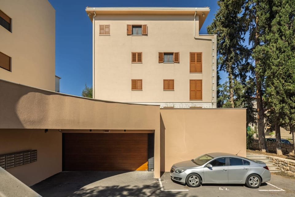 Property building, Facade/entrance, Day, Parking