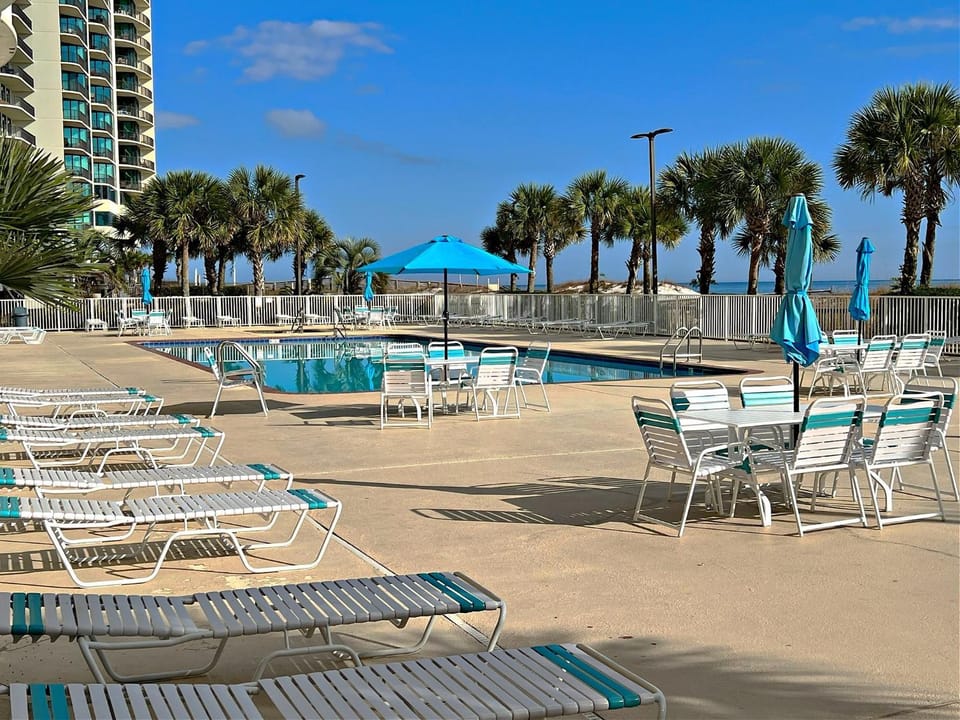Property building, Day, Pool view, sunbed