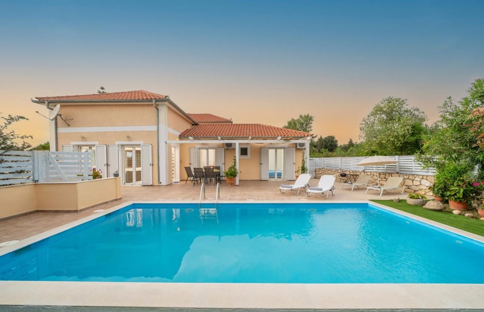 Property building, Patio, Pool view, Swimming pool, sunbed