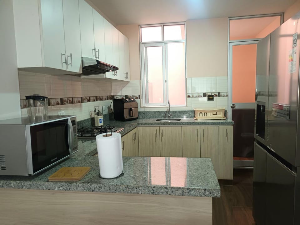 Kitchen or kitchenette, microwave, laundry