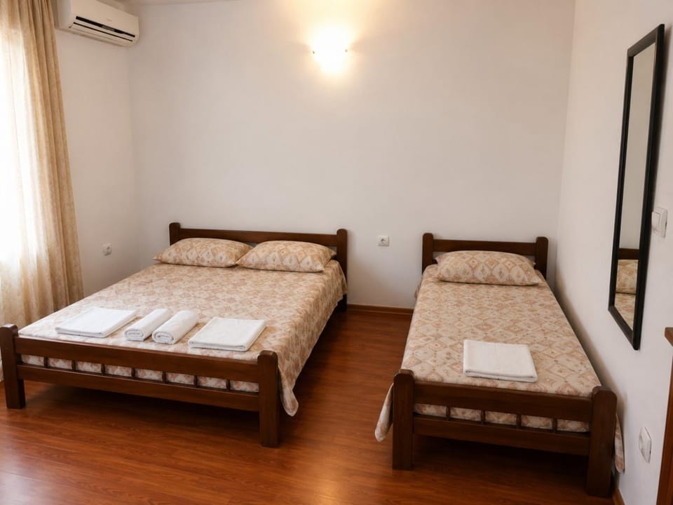 Bed, Photo of the whole room, Bedroom, towels, air conditioner