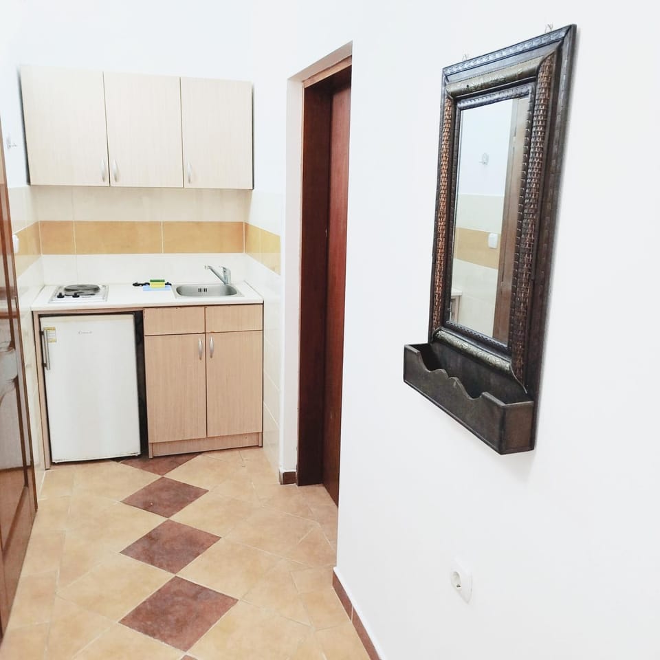 Kitchen or kitchenette, stove