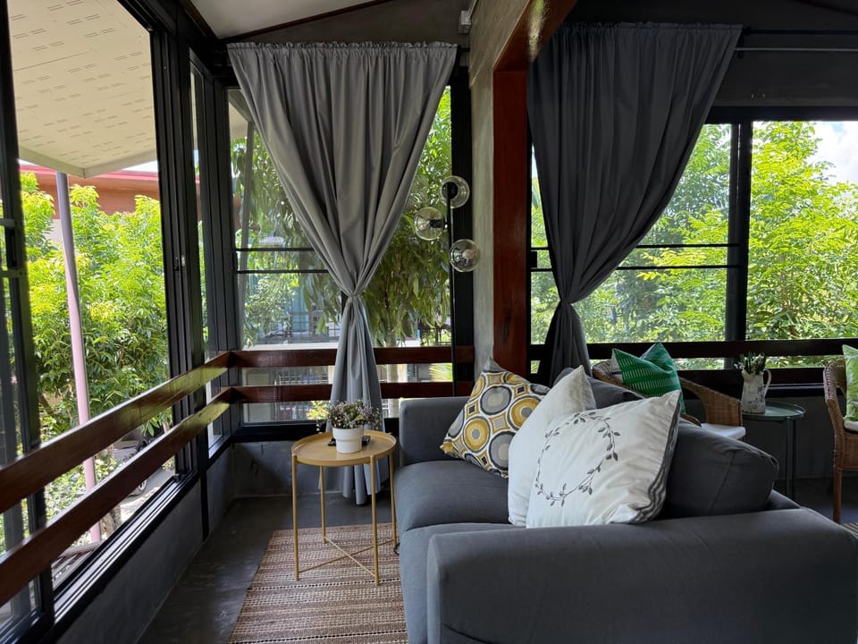 View (from property/room), Living room, Seating area, Garden view