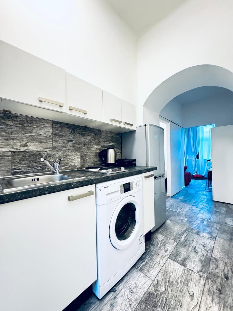 Kitchen or kitchenette, stove, washing machine