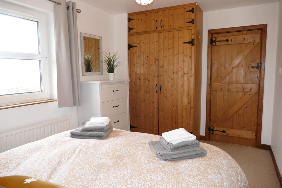 Property building, Bed, Bedroom, towels, wardrobe