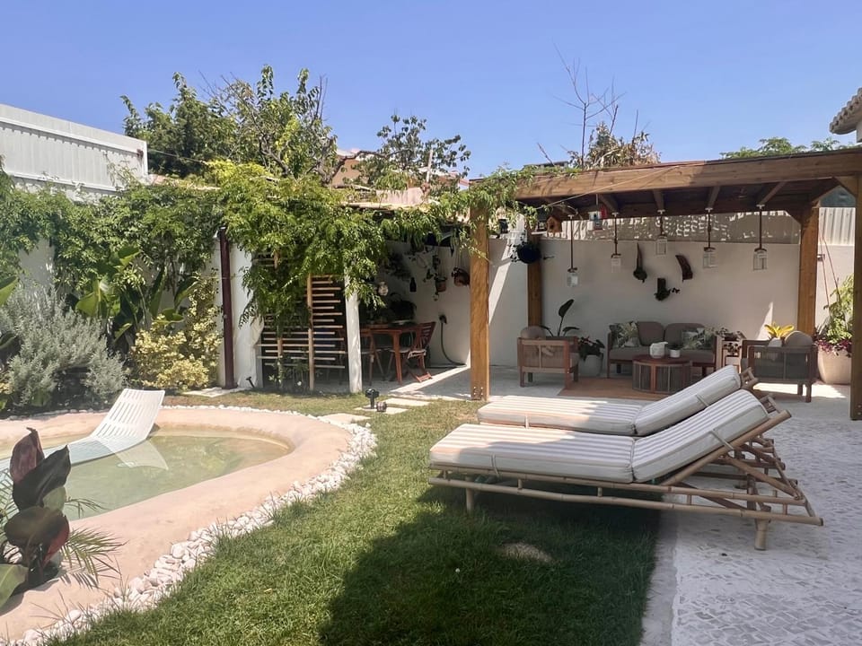 Property building, Living room, Swimming pool