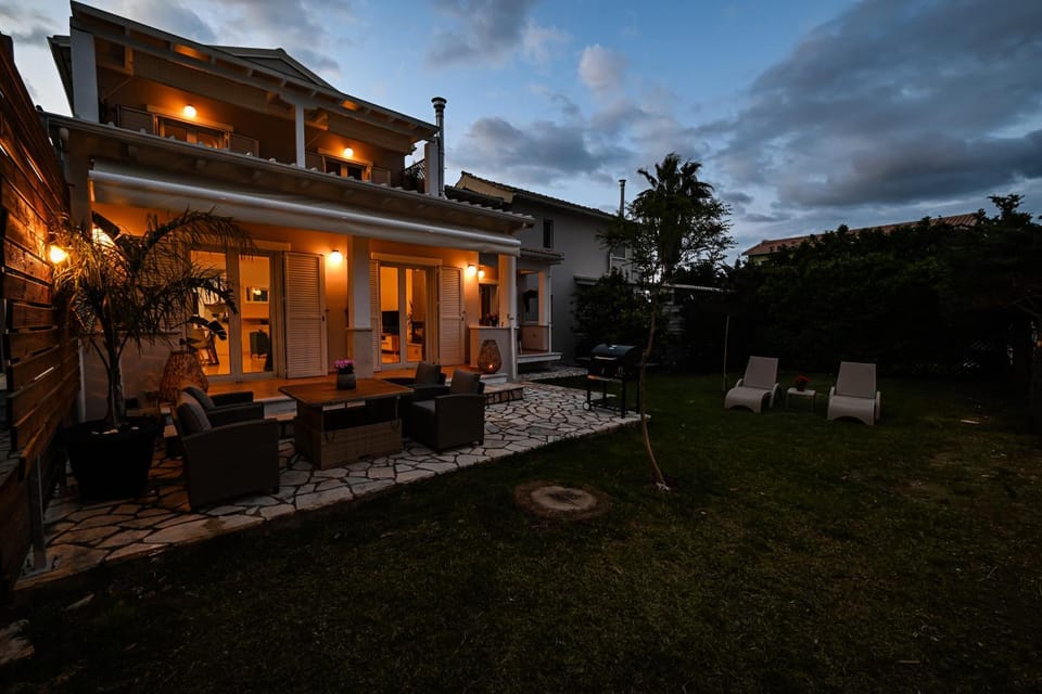 Property building, Patio, Night, Garden, Seating area, Garden view