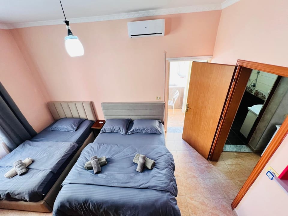 Photo of the whole room, Bedroom, towels, air conditioner