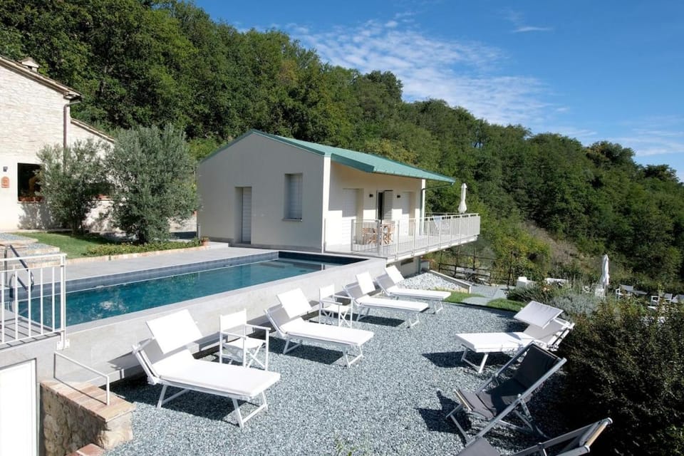 Property building, Day, Natural landscape, Pool view, Swimming pool, sunbed