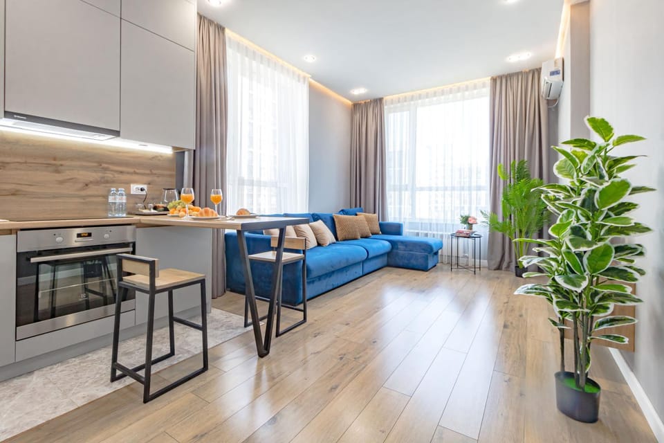 Kitchen or kitchenette, Living room, Seating area, Dining area