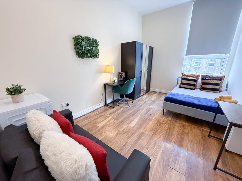 Bed, Seating area, Bedroom, towels, wardrobe