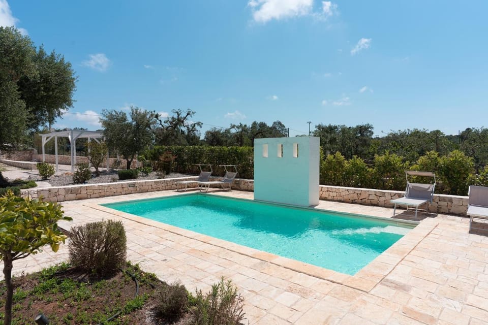 Property building, Living room, Swimming pool