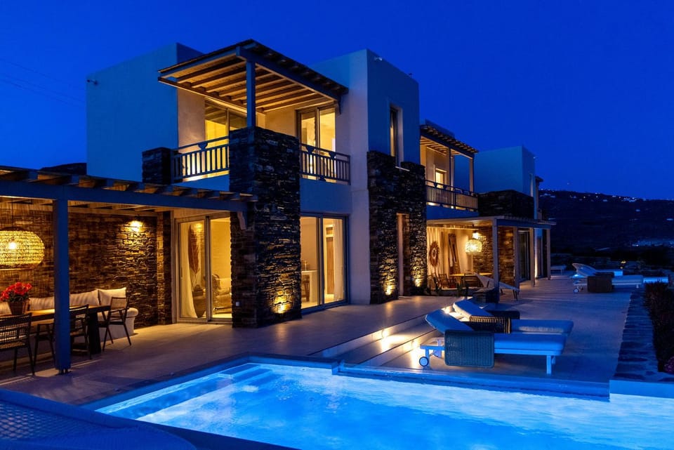 Property building, Patio, Night, Natural landscape, Swimming pool