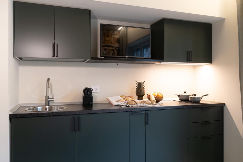 Kitchen or kitchenette, stove