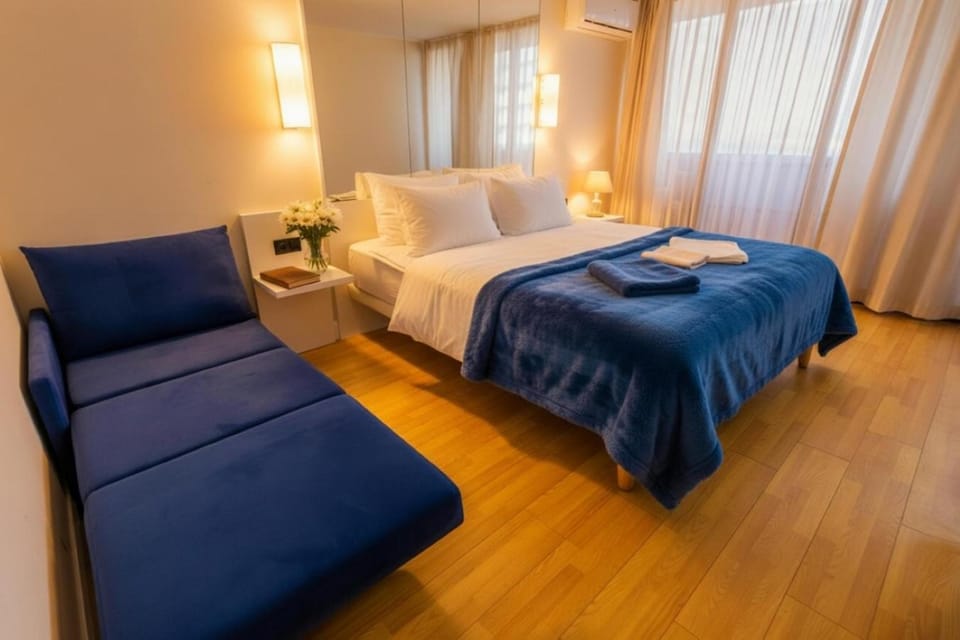 Toilet, Bed, Bathroom, Living room, Photo of the whole room, Seating area, Bedroom, Bath