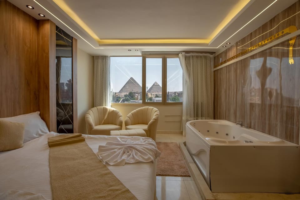 Bed, Living room, Photo of the whole room, Seating area, Bedroom, towels