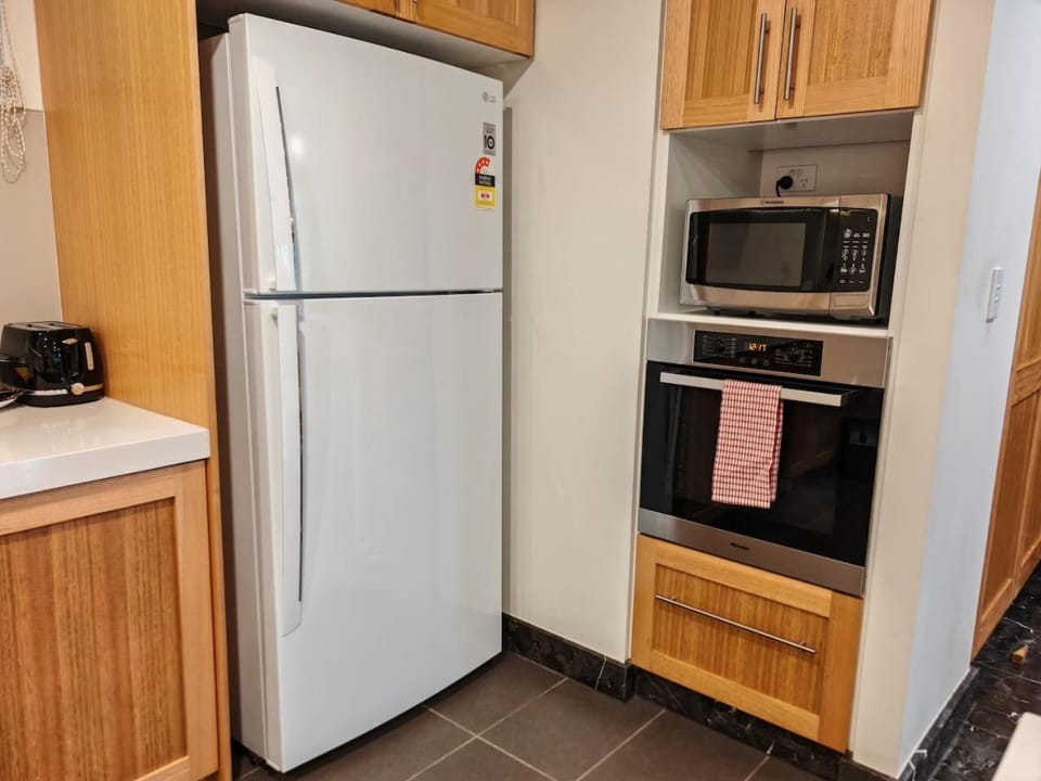 Kitchen or kitchenette, oven