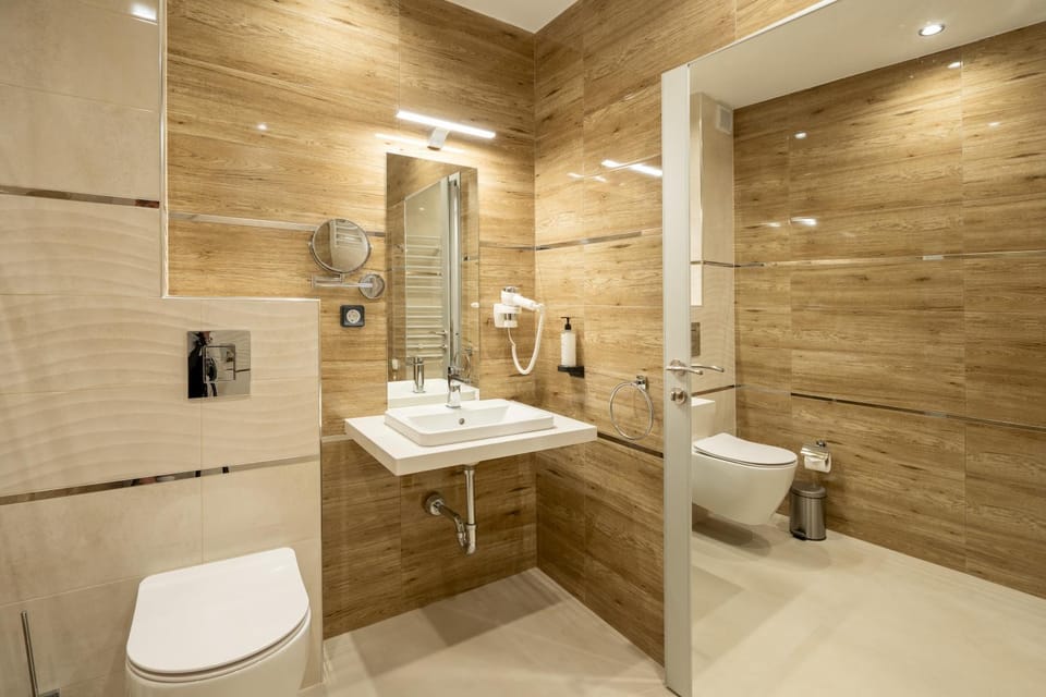 Shower, Toilet, Bathroom, bidet, hair dryier, towels