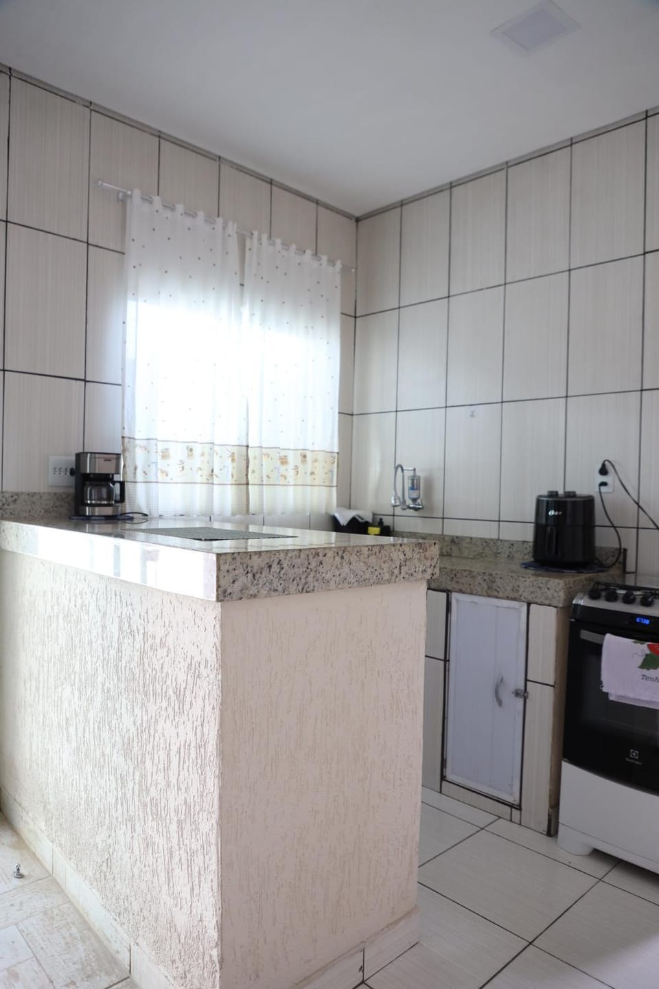 Kitchen or kitchenette, oven, stove