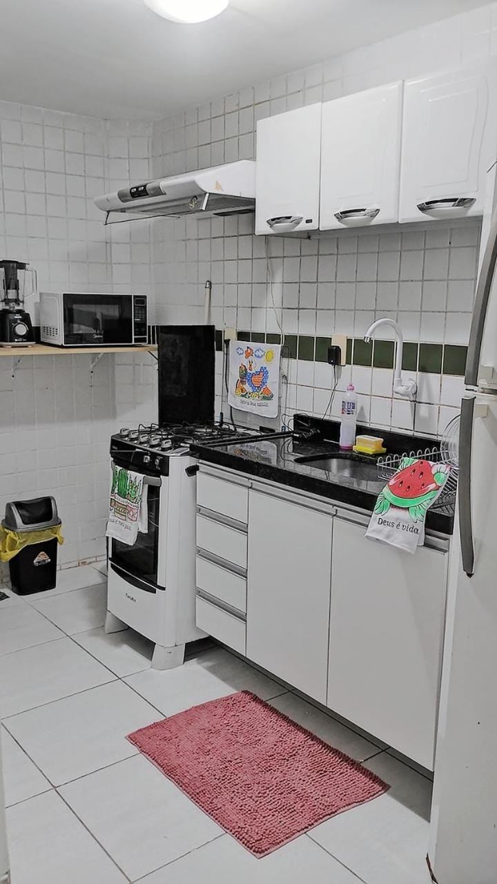 Kitchen or kitchenette, microwave, minibar, oven, stove