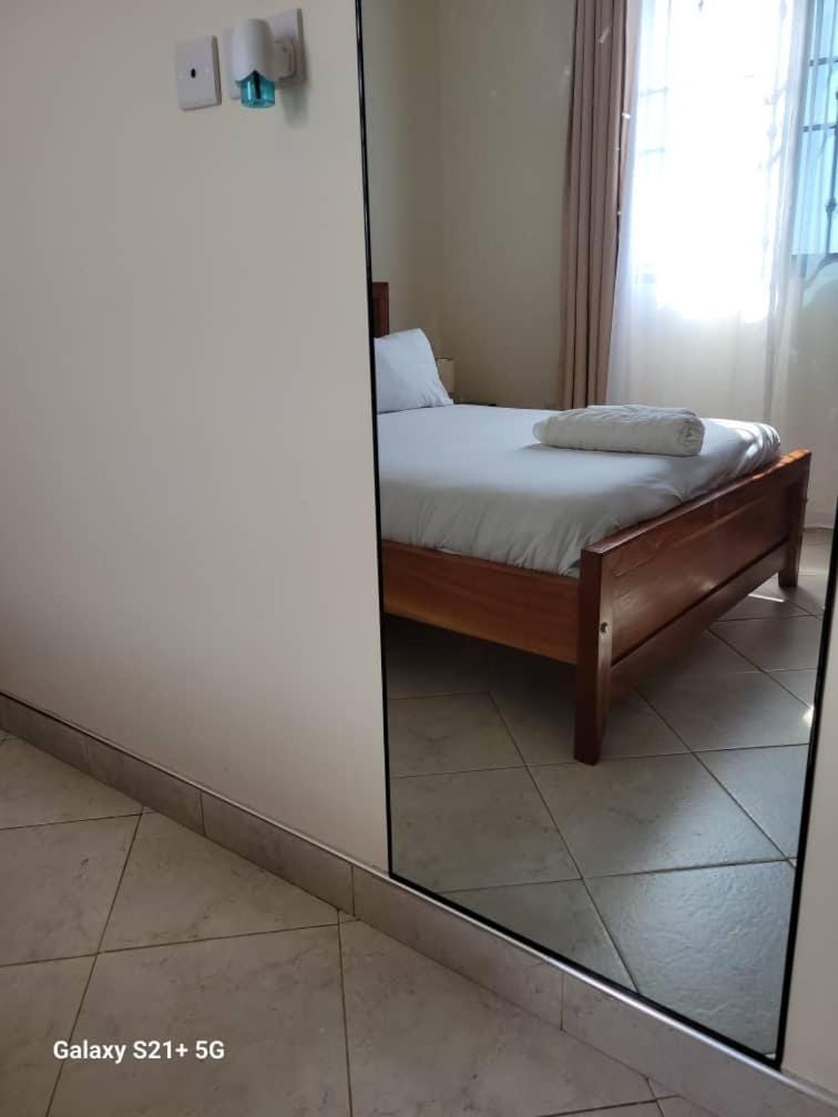 Barksdale Cheap homes in Kisasi with AC, Wi-Fi & Netflix Apartment in Kampala