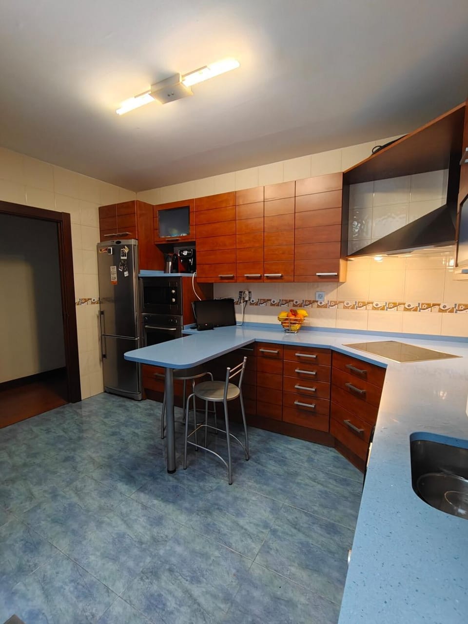 Kitchen or kitchenette, dishwasher, oven, stove