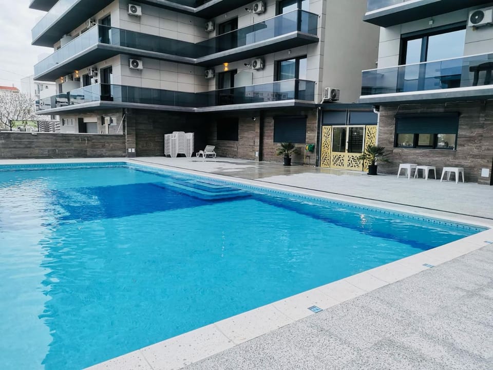 Property building, Day, View (from property/room), Pool view, Swimming pool, Swimming pool, sunbed