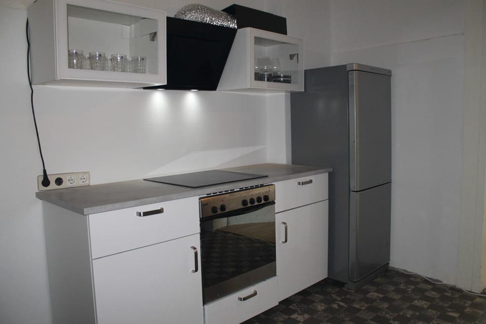 Kitchen or kitchenette, stove, kitchen