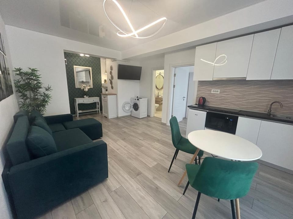 Kitchen or kitchenette, Living room, Seating area, Dining area