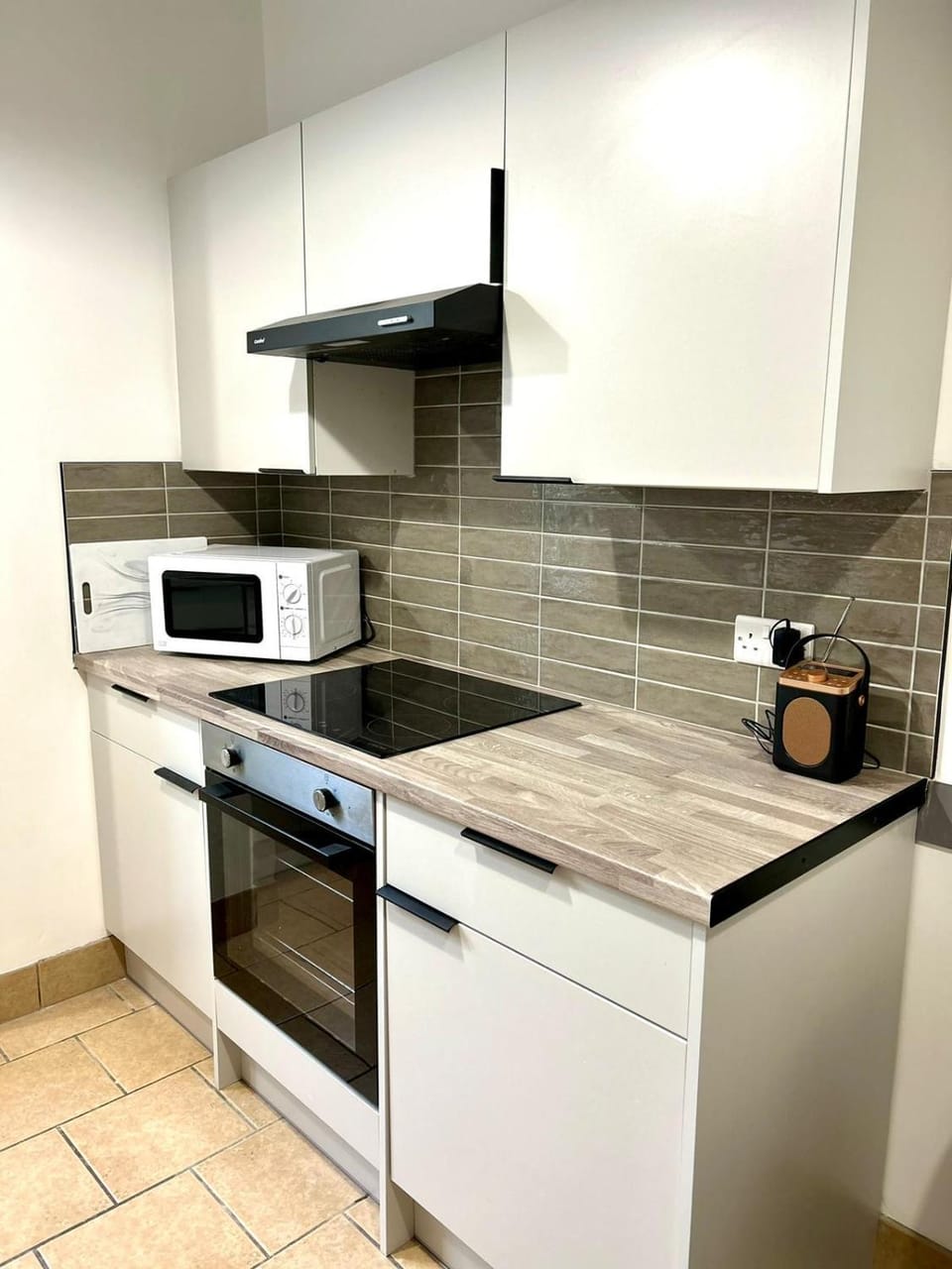 Kitchen or kitchenette, oven, stove
