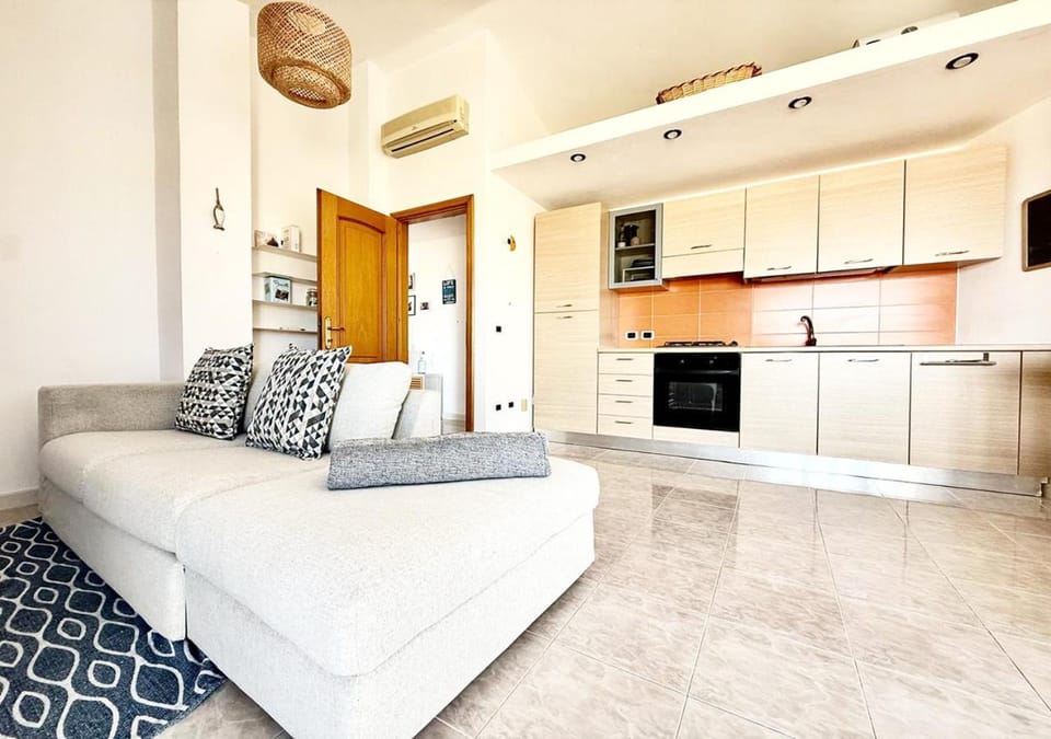 Kitchen or kitchenette, Living room, Seating area, Dining area, oven, stove, air conditioner