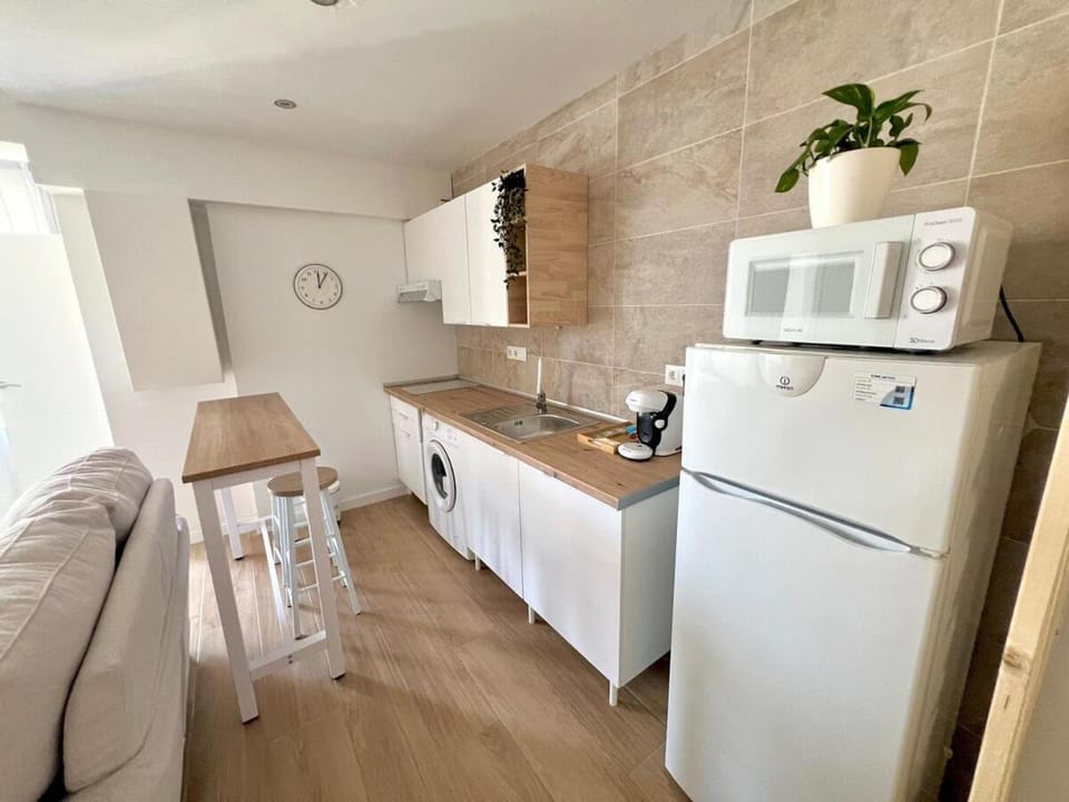 Kitchen or kitchenette, stove