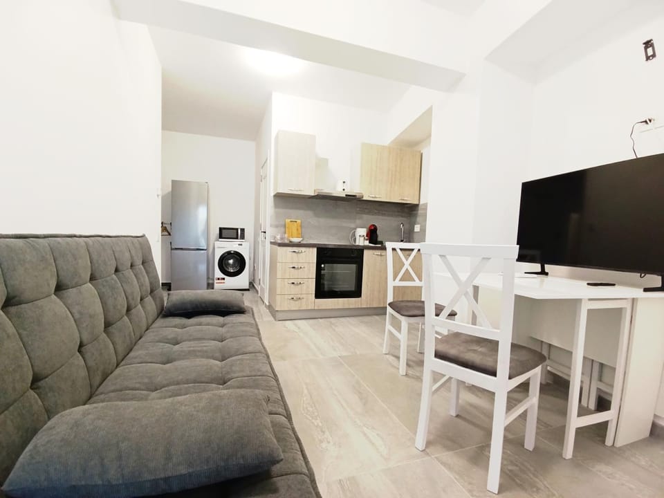 Kitchen or kitchenette, Seating area, washing machine, air conditioner