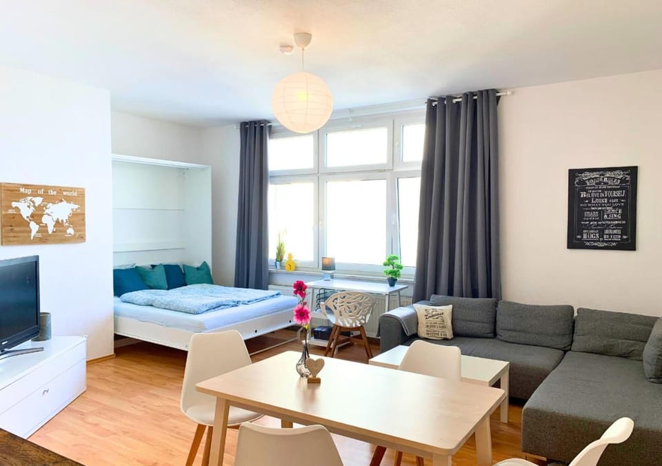 Bed, TV and multimedia, Living room, Seating area, Dining area