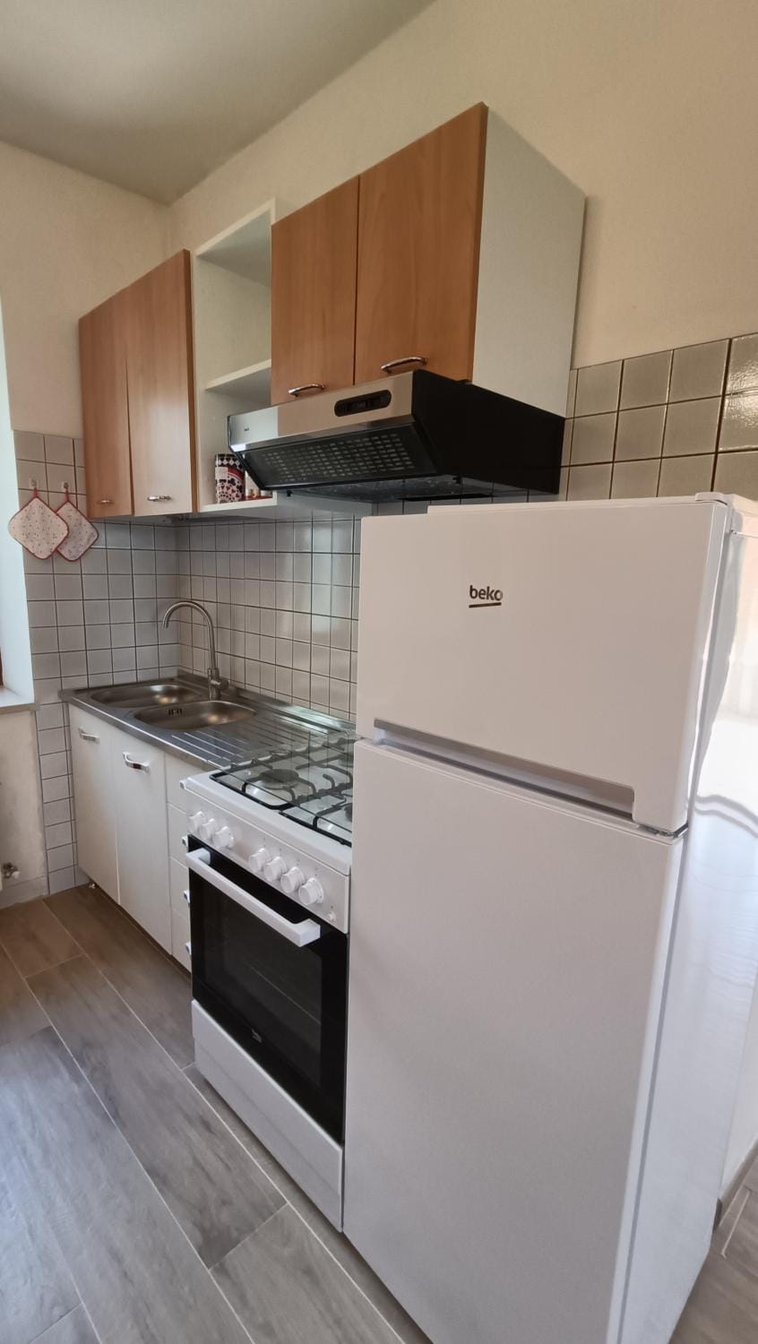 Kitchen or kitchenette, oven, stove