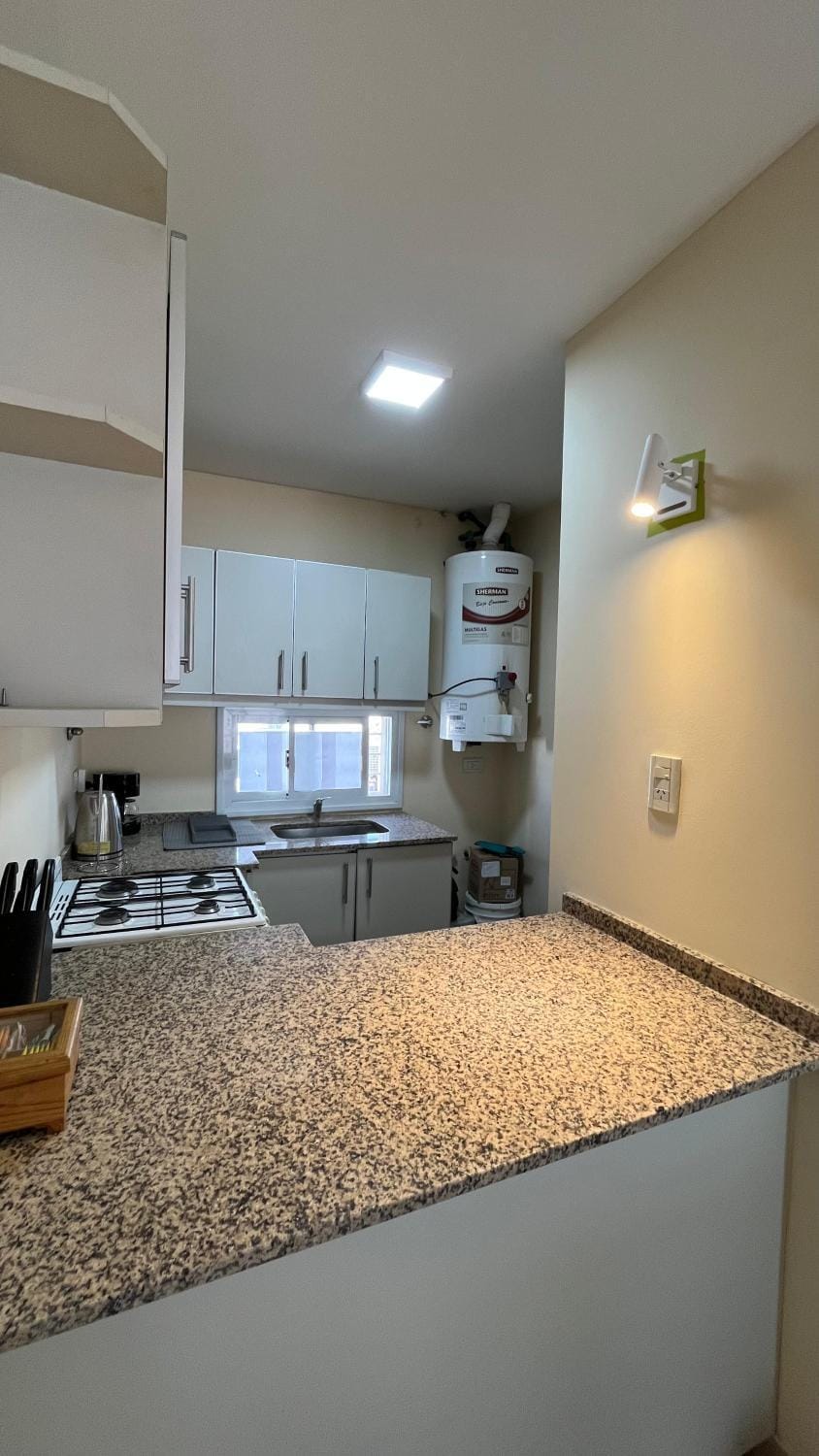 Kitchen or kitchenette, stove