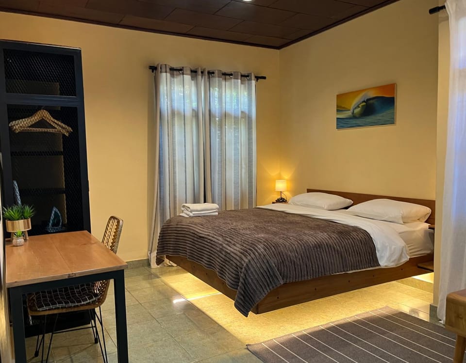 Bed, Photo of the whole room, Bedroom, flat iron, towels, wardrobe