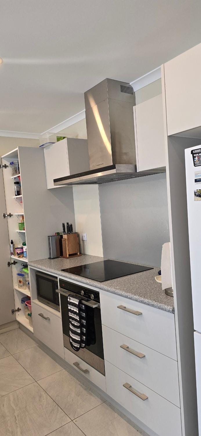 Kitchen or kitchenette, oven, stove
