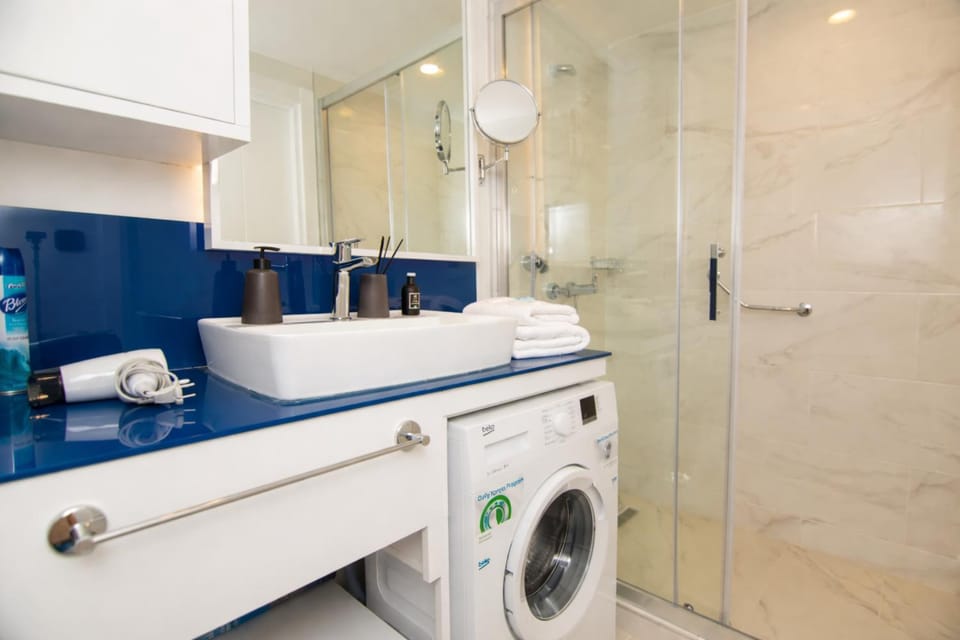 Shower, Bathroom, towels, washing machine, dryer