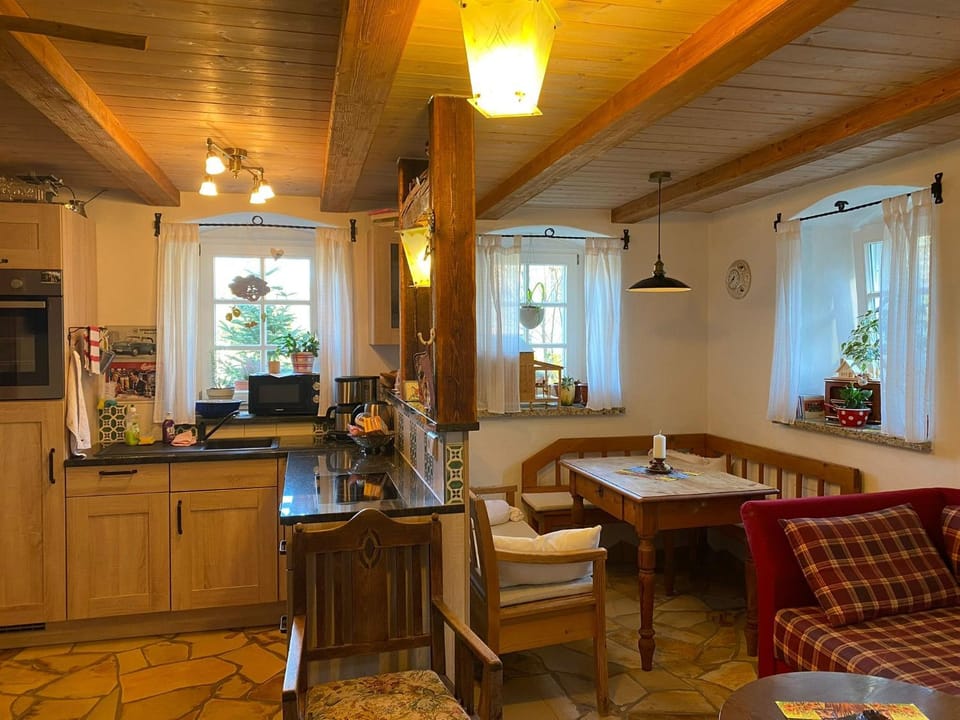 Kitchen or kitchenette, Living room, Seating area, Dining area